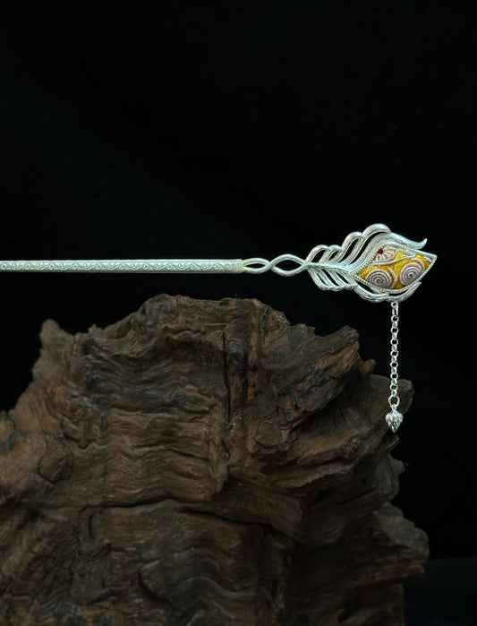 Sunspiral Feather under the Phoenix Veil